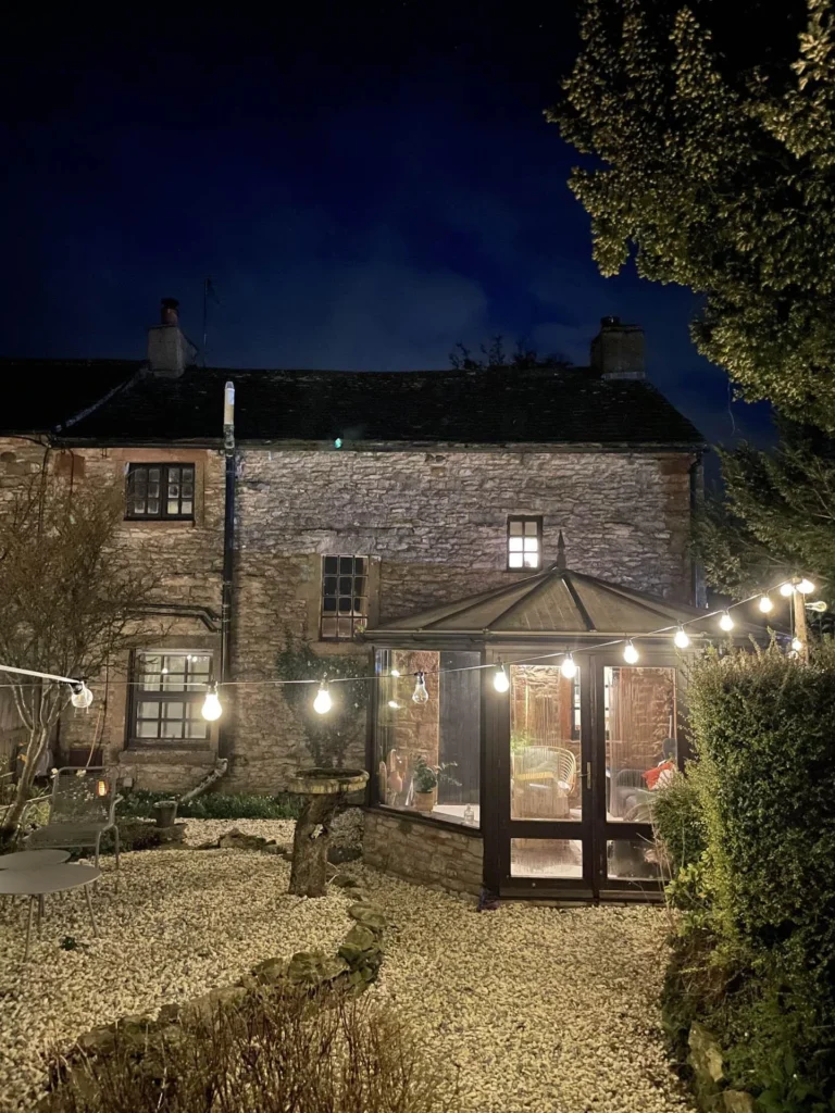 Fern Cottage conservatory with comfortable seating and garden views