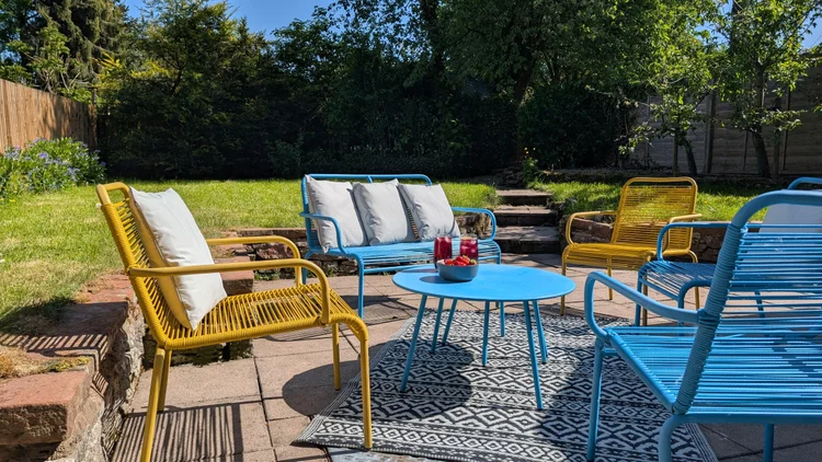 Maple Cottage cosy living room with fireplace and comfortable seating